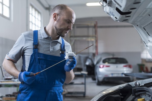 Mechanic checking a car 